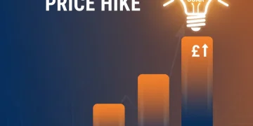 Rising UK energy prices chart with light bulb
